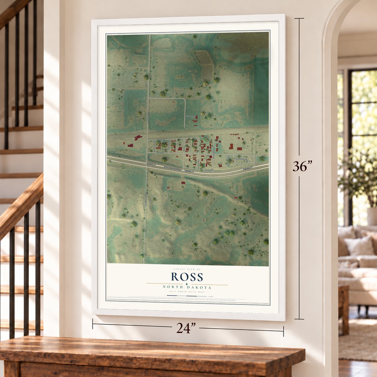 Ross, North Dakota map, 24 x 36 inch print in a white frame by a staircase