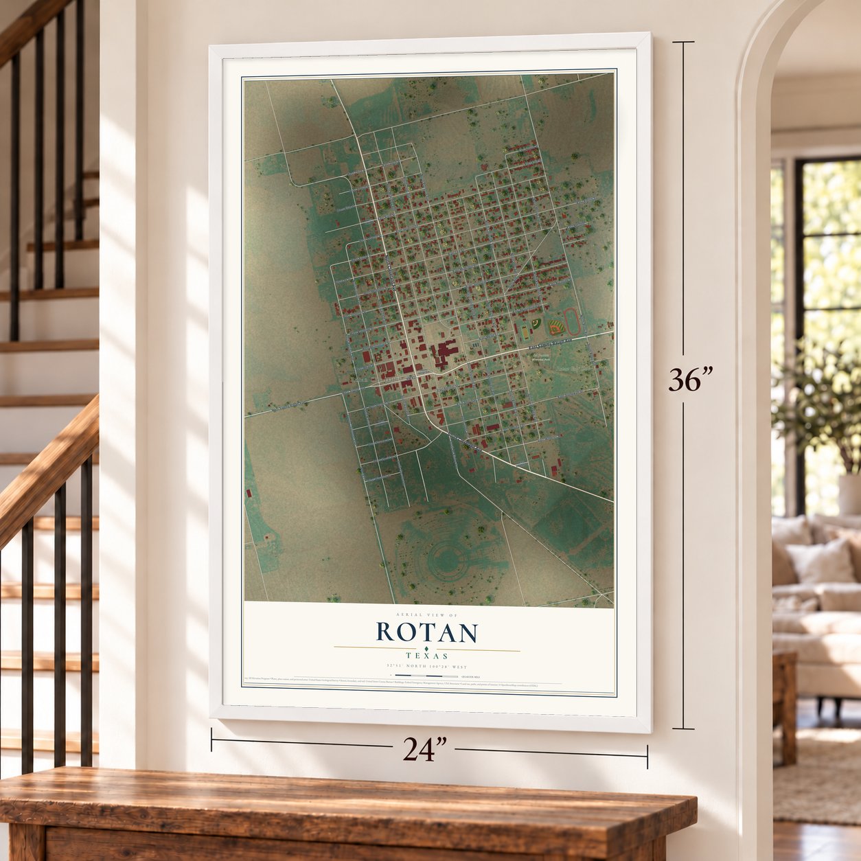 Rotan, Texas map, 24 x 36 inch print in a white frame by a staircase