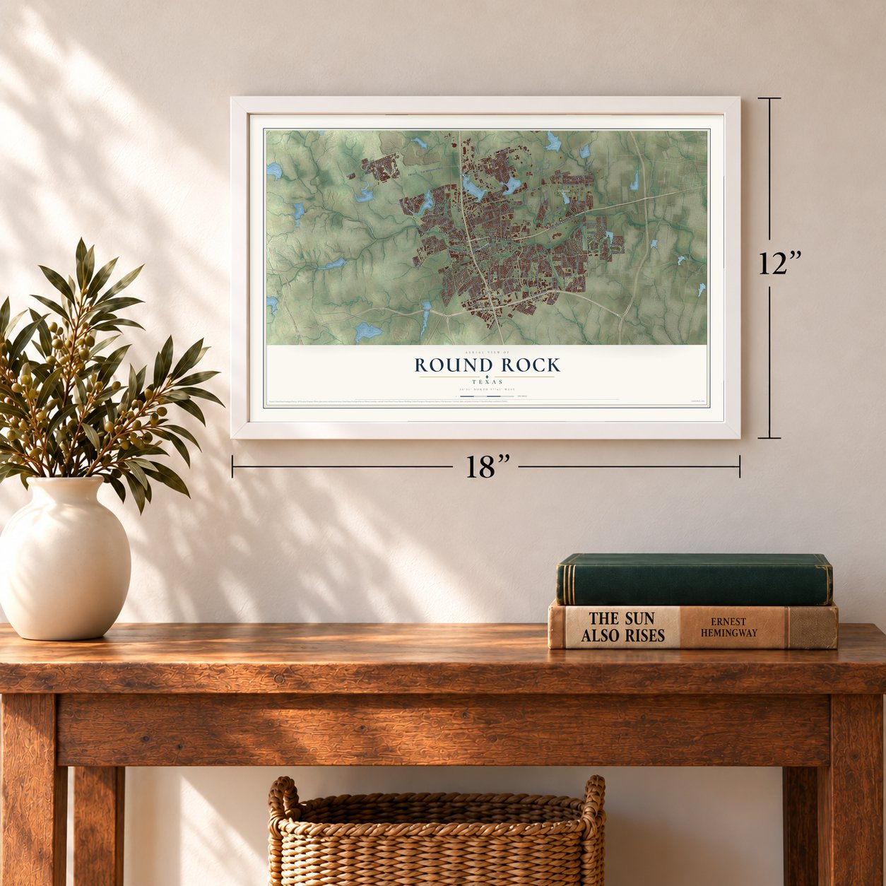 Round Rock, Texas map, 12 x 18 inch print in a white frame in an entryway