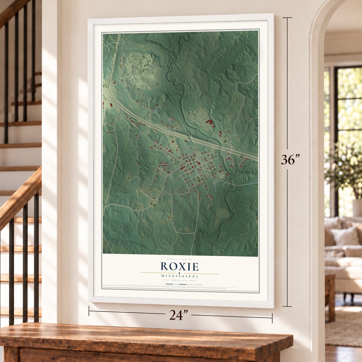 Roxie, Mississippi map, 24 x 36 inch print in a white frame by a staircase