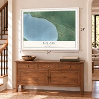 Roy Lake, Minnesota map, 24 x 36 inch print in a white frame above a dresser by a staircase