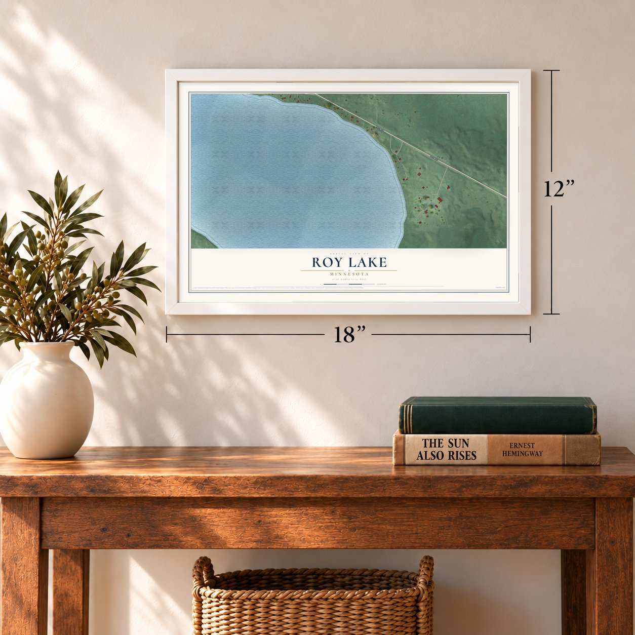 Roy Lake, Minnesota map, 12 x 18 inch print in a white frame in an entryway