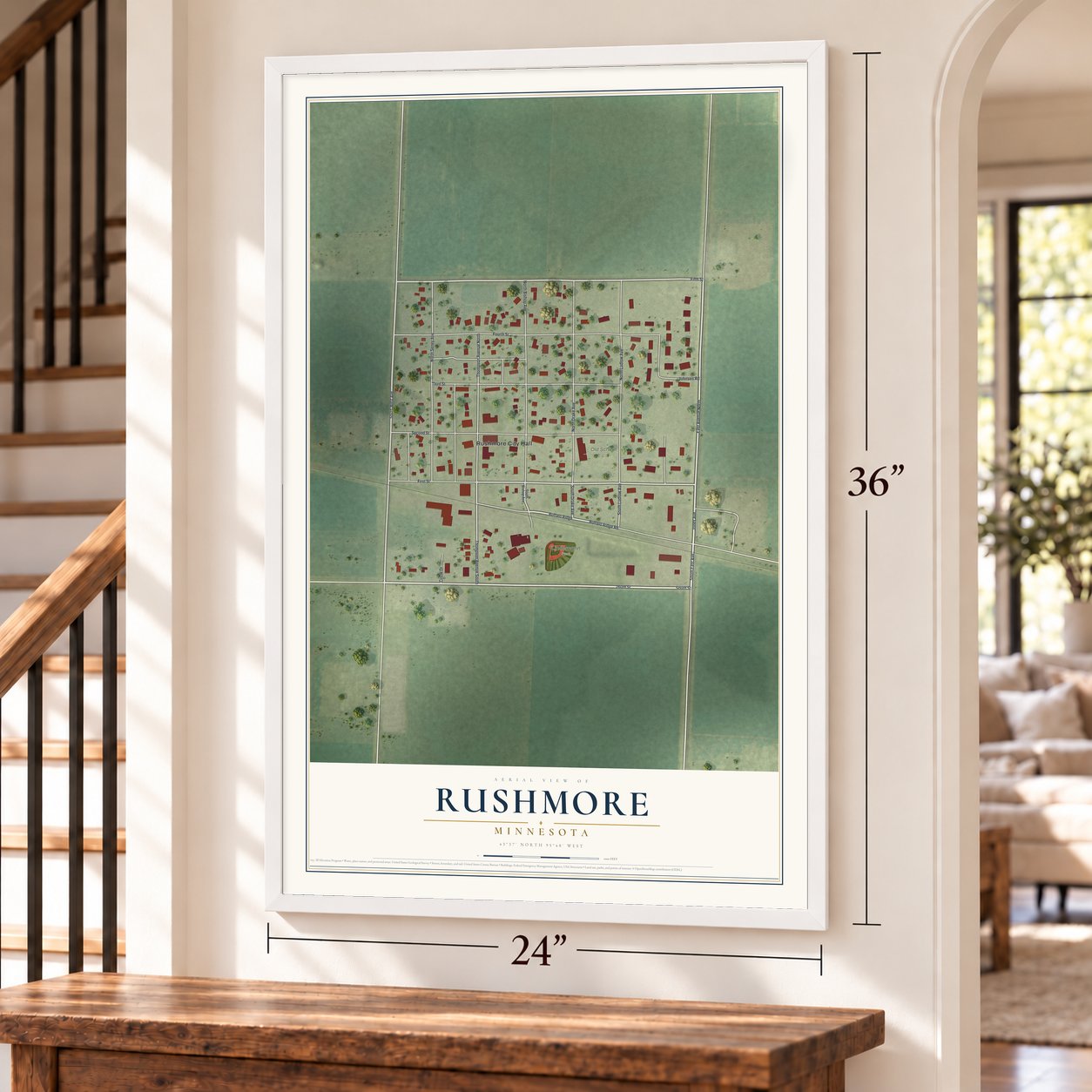 Rushmore, Minnesota map, 24 x 36 inch print in a white frame by a staircase