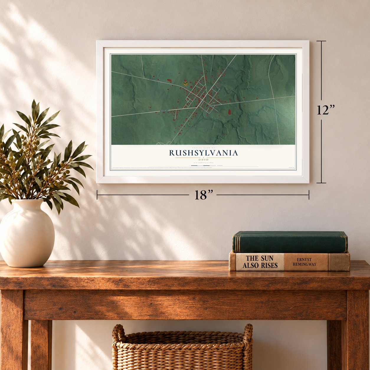 Rushsylvania, Ohio map, 12 x 18 inch print in a white frame in an entryway