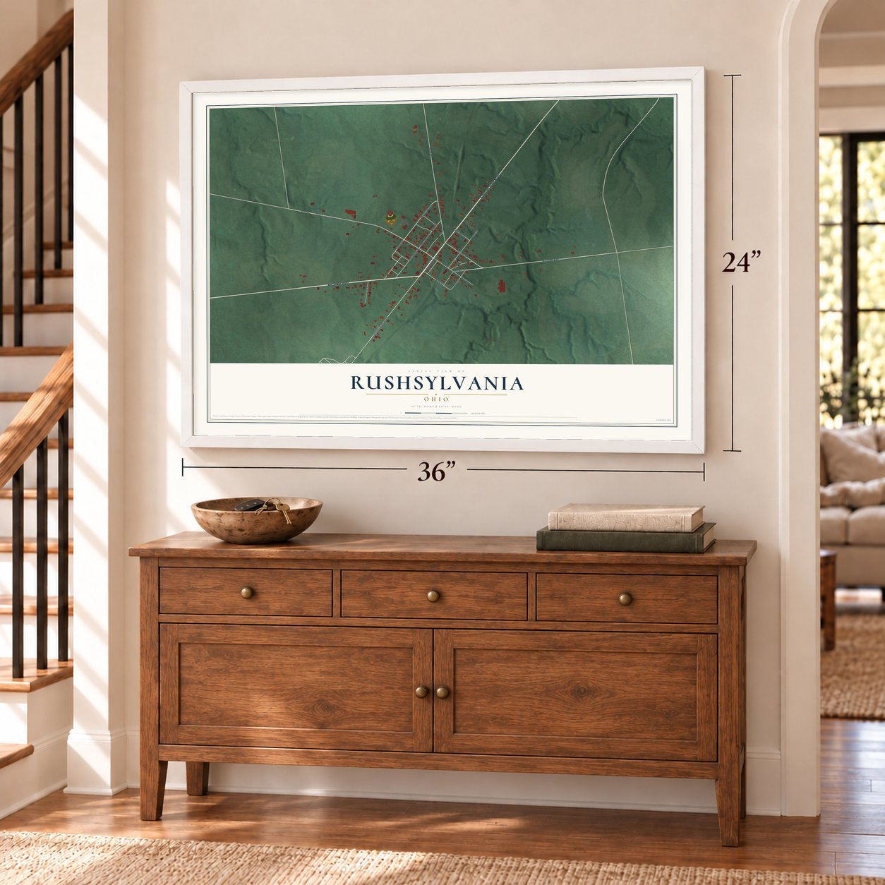 Rushsylvania, Ohio map, 24 x 36 inch print in a white frame above a dresser by a staircase