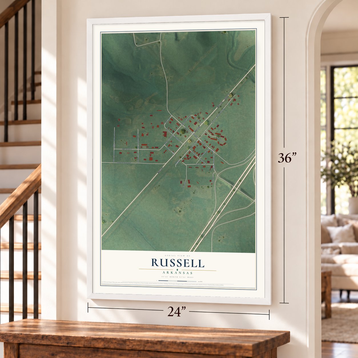 Russell, Arkansas map, 24 x 36 inch print in a white frame by a staircase