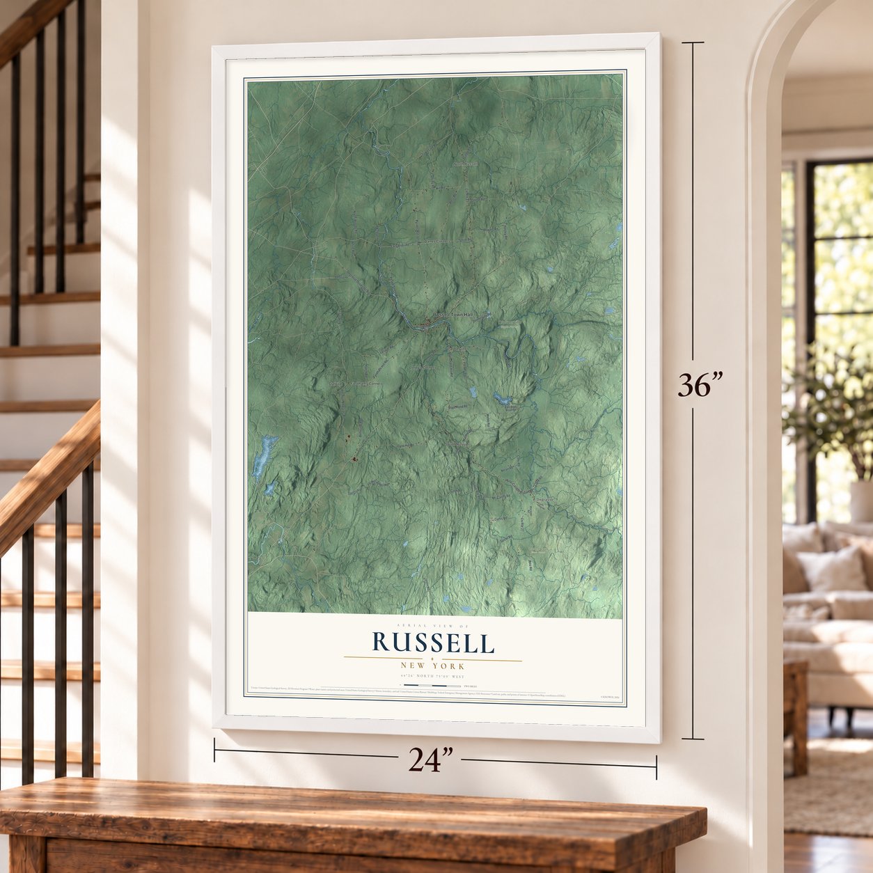 Russell, New York map, 24 x 36 inch print in a white frame by a staircase