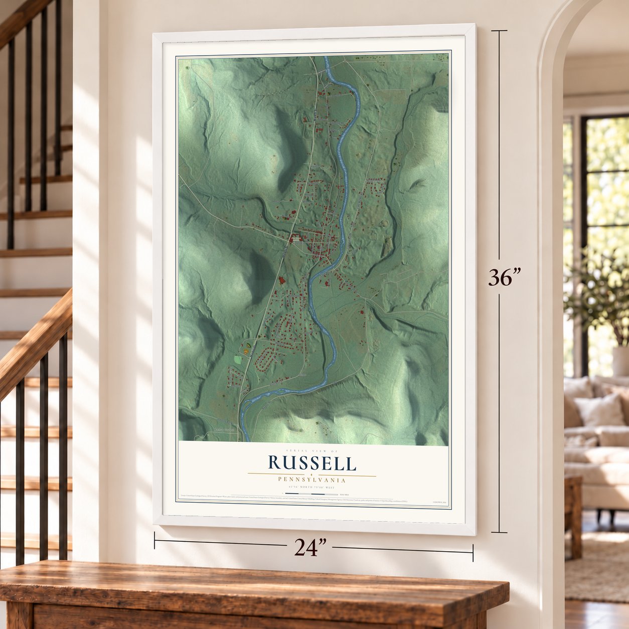 Russell, Pennsylvania map, 24 x 36 inch print in a white frame by a staircase