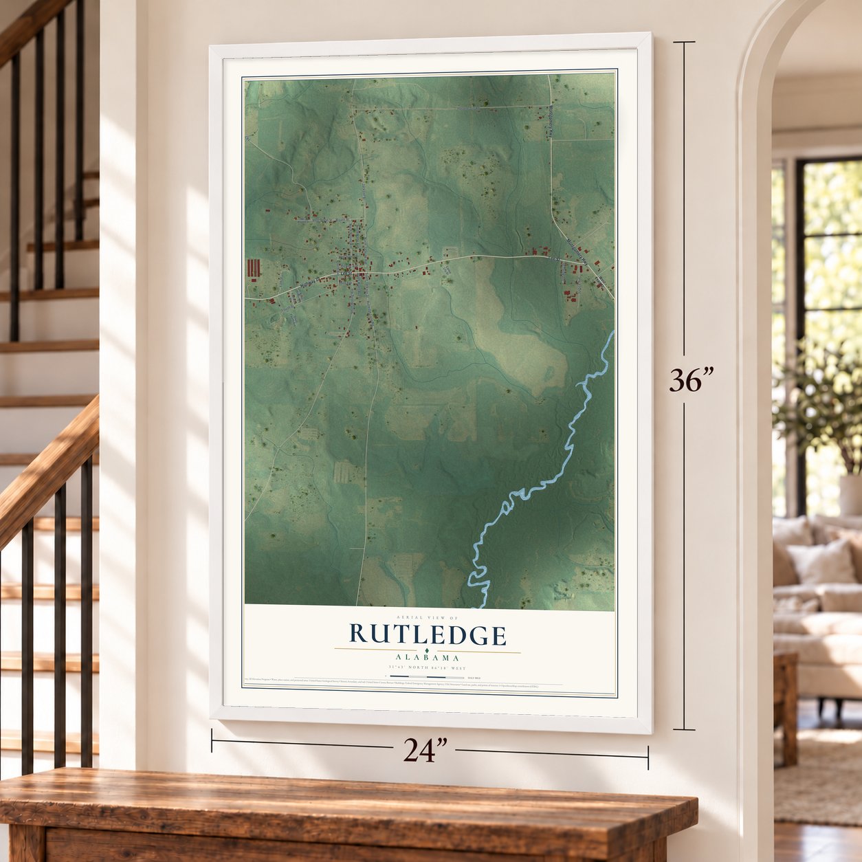 Rutledge, Alabama map, 24 x 36 inch print in a white frame by a staircase