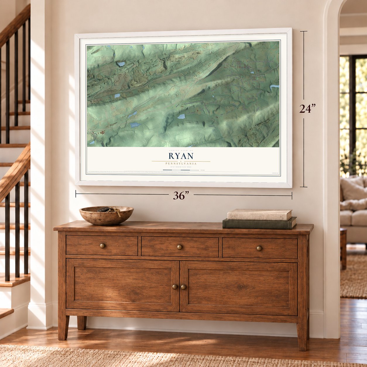 Ryan, Pennsylvania map, 24 x 36 inch print in a white frame above a dresser by a staircase