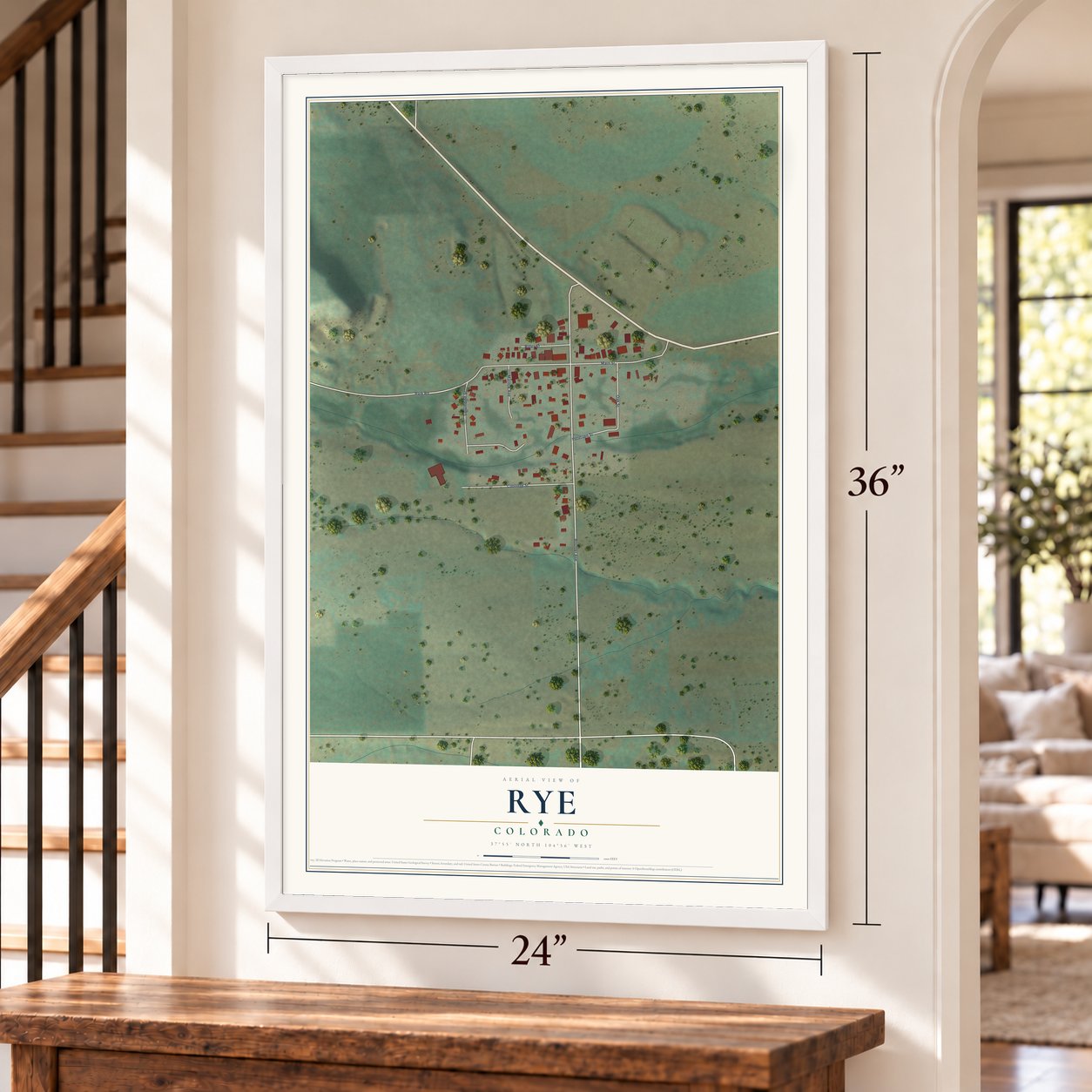 Rye, Colorado map, 24 x 36 inch print in a white frame by a staircase