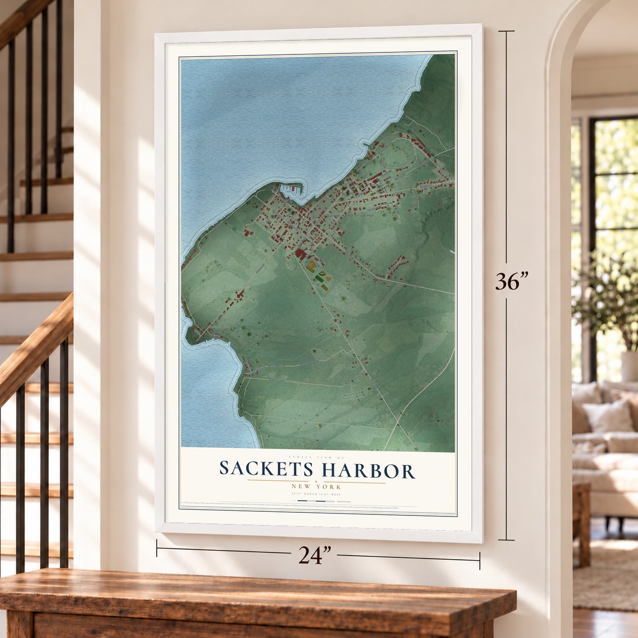 Sackets Harbor, New York map, 24 x 36 inch print in a white frame by a staircase