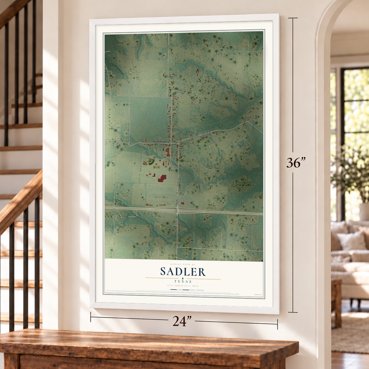 Sadler, Texas map, 24 x 36 inch print in a white frame by a staircase