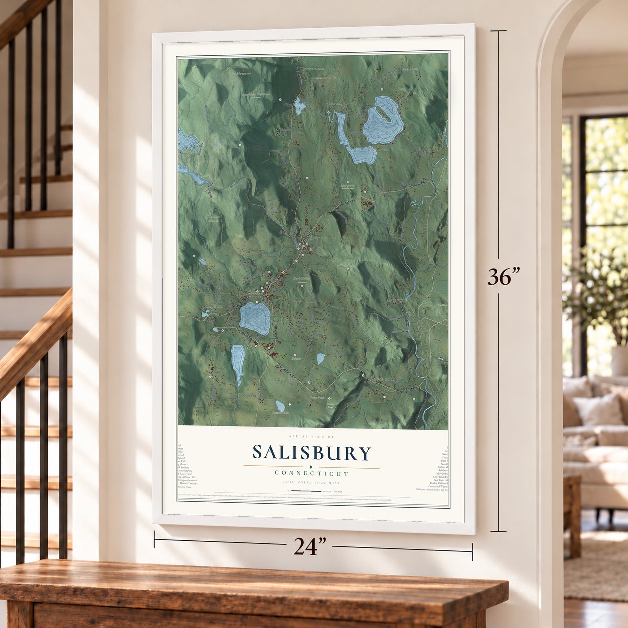 Salisbury, Connecticut map, 24 x 36 inch print in a white frame by a staircase