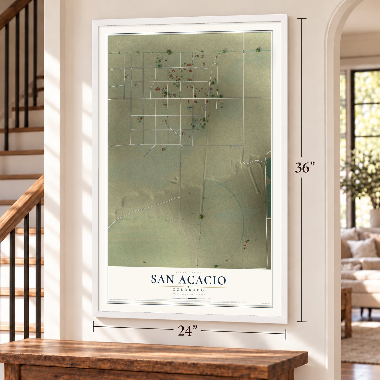 San Acacio, Colorado map, 24 x 36 inch print in a white frame by a staircase