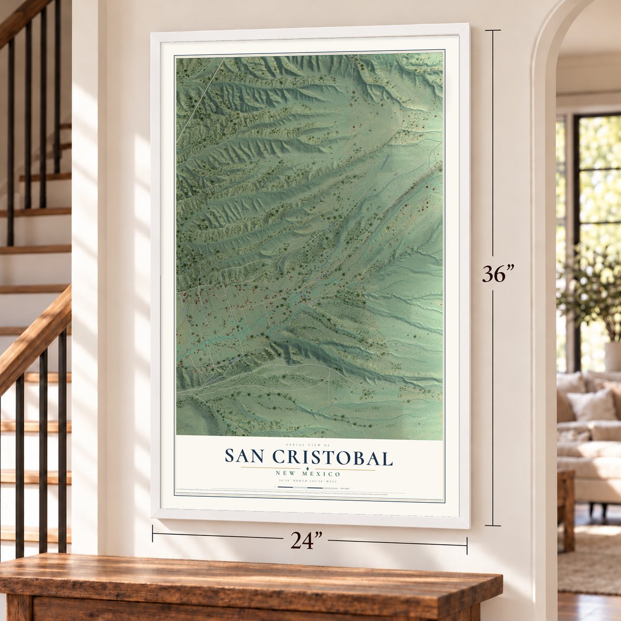 San Cristobal, New Mexico map, 24 x 36 inch print in a white frame by a staircase