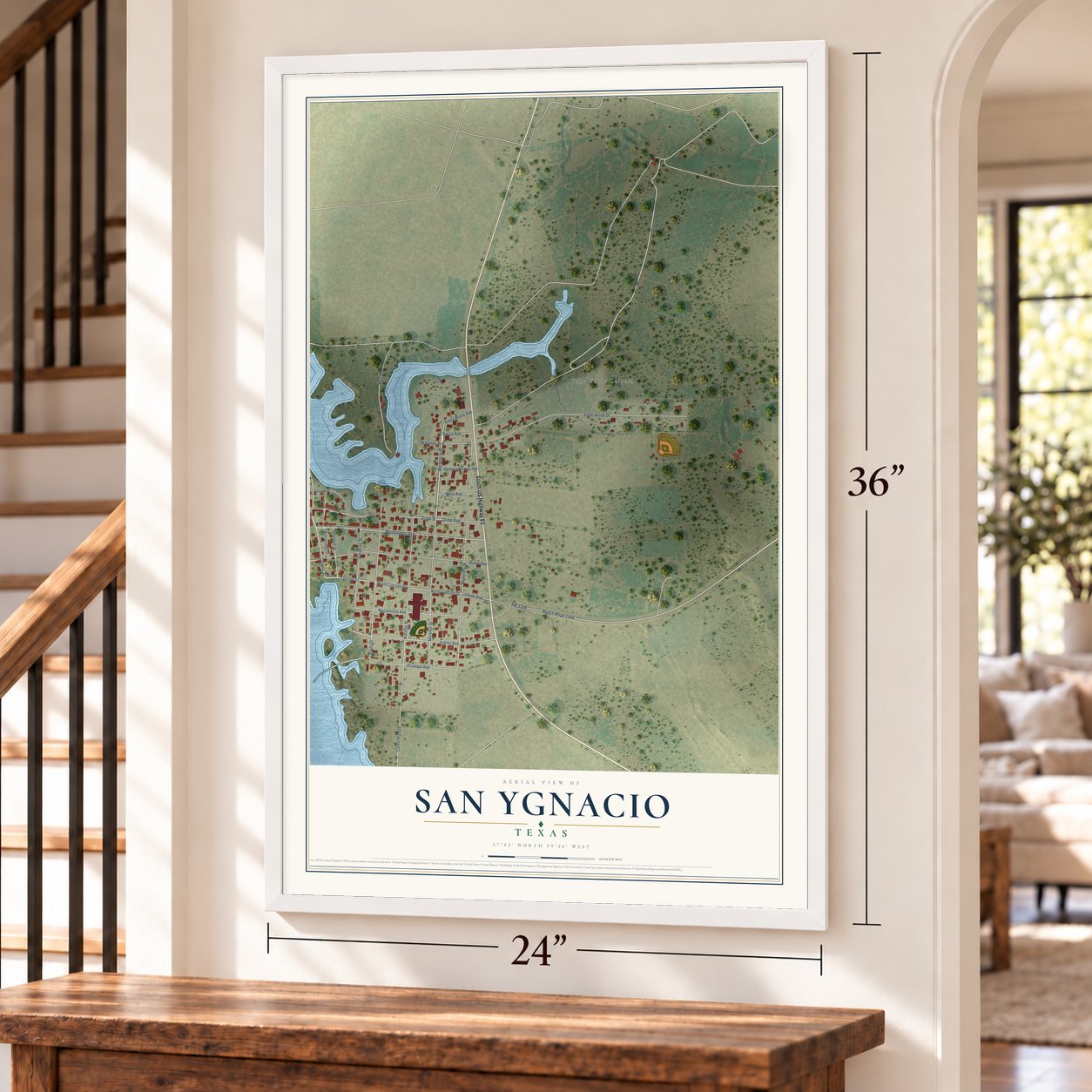 San Ygnacio, Texas map, 24 x 36 inch print in a white frame by a staircase