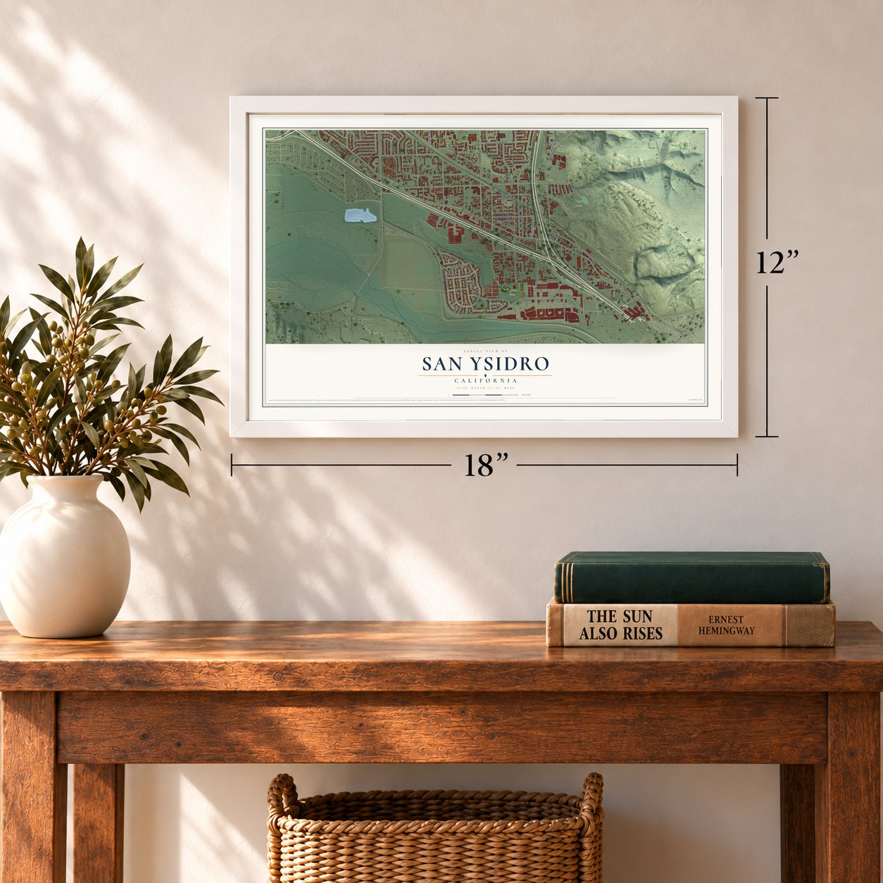 San Ysidro, California map, 12 x 18 inch print in a white frame in an entryway