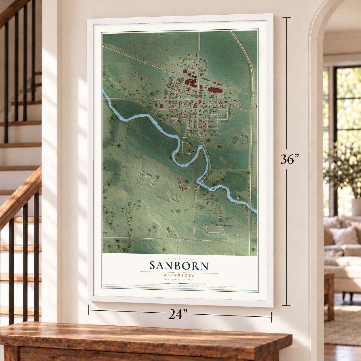 Sanborn, Minnesota map, 24 x 36 inch print in a white frame by a staircase
