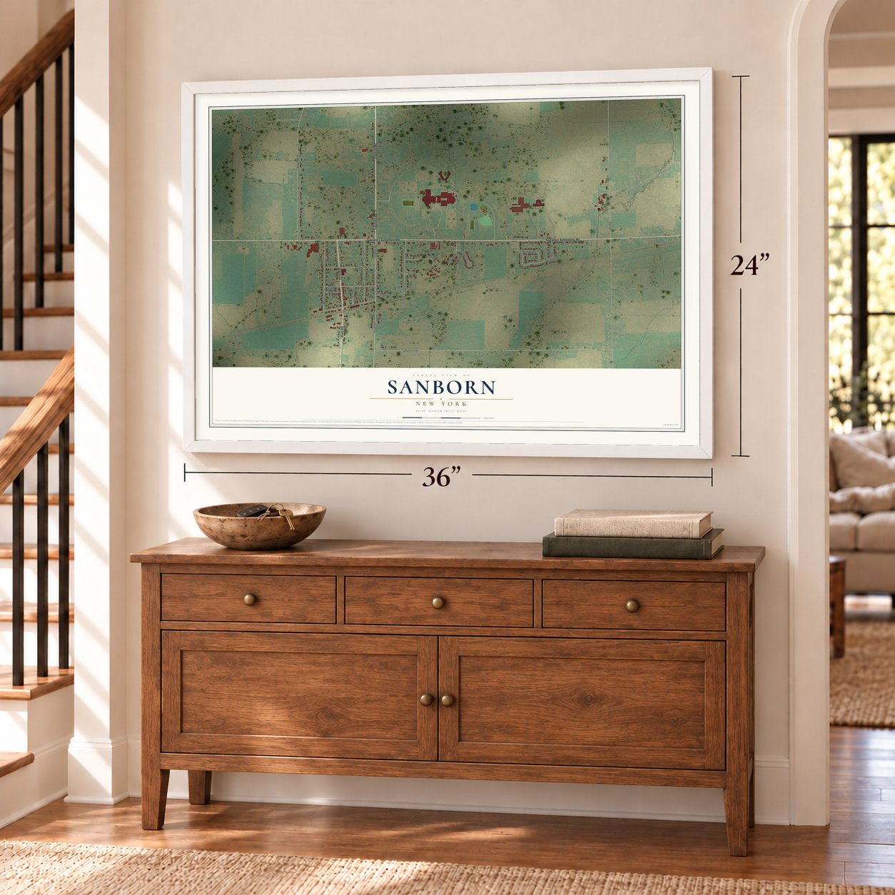 Sanborn, New York map, 24 x 36 inch print in a white frame above a dresser by a staircase