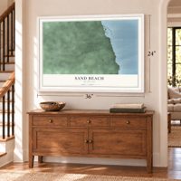 Sand Beach, Michigan map, 24 x 36 inch print in a white frame above a dresser by a staircase