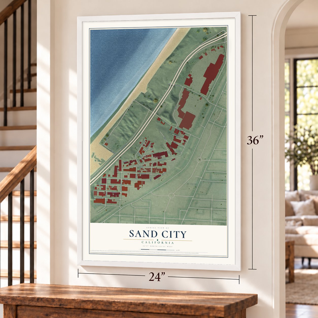 Sand City, California map, 24 x 36 inch print in a white frame by a staircase