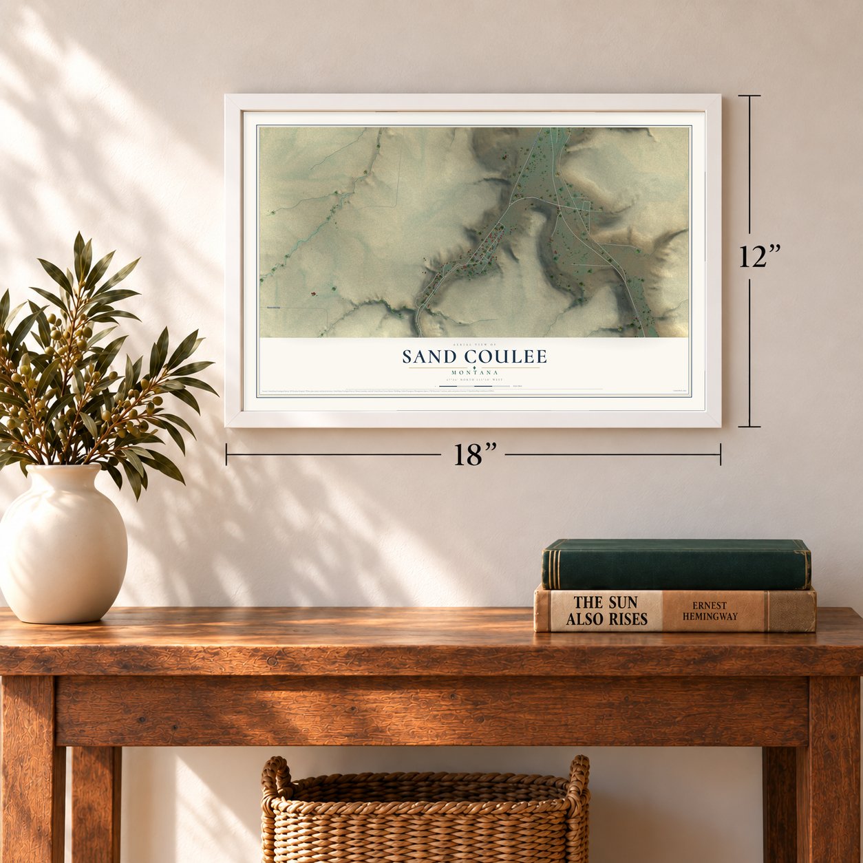 Sand Coulee, Montana map, 12 x 18 inch print in a white frame in an entryway