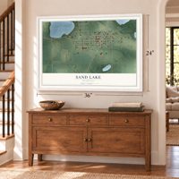 Sand Lake, Michigan map, 24 x 36 inch print in a white frame above a dresser by a staircase