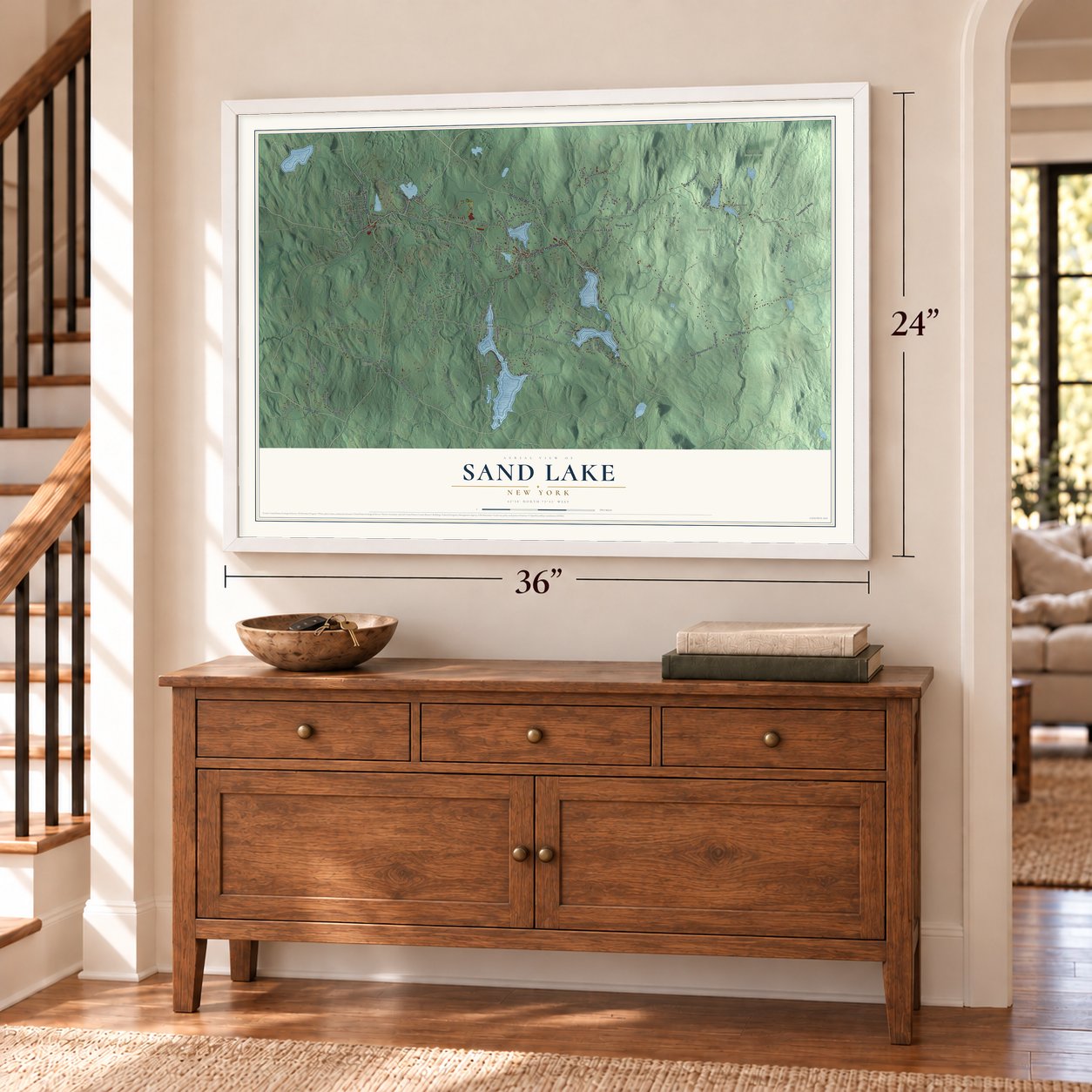 Sand Lake, New York map, 24 x 36 inch print in a white frame above a dresser by a staircase