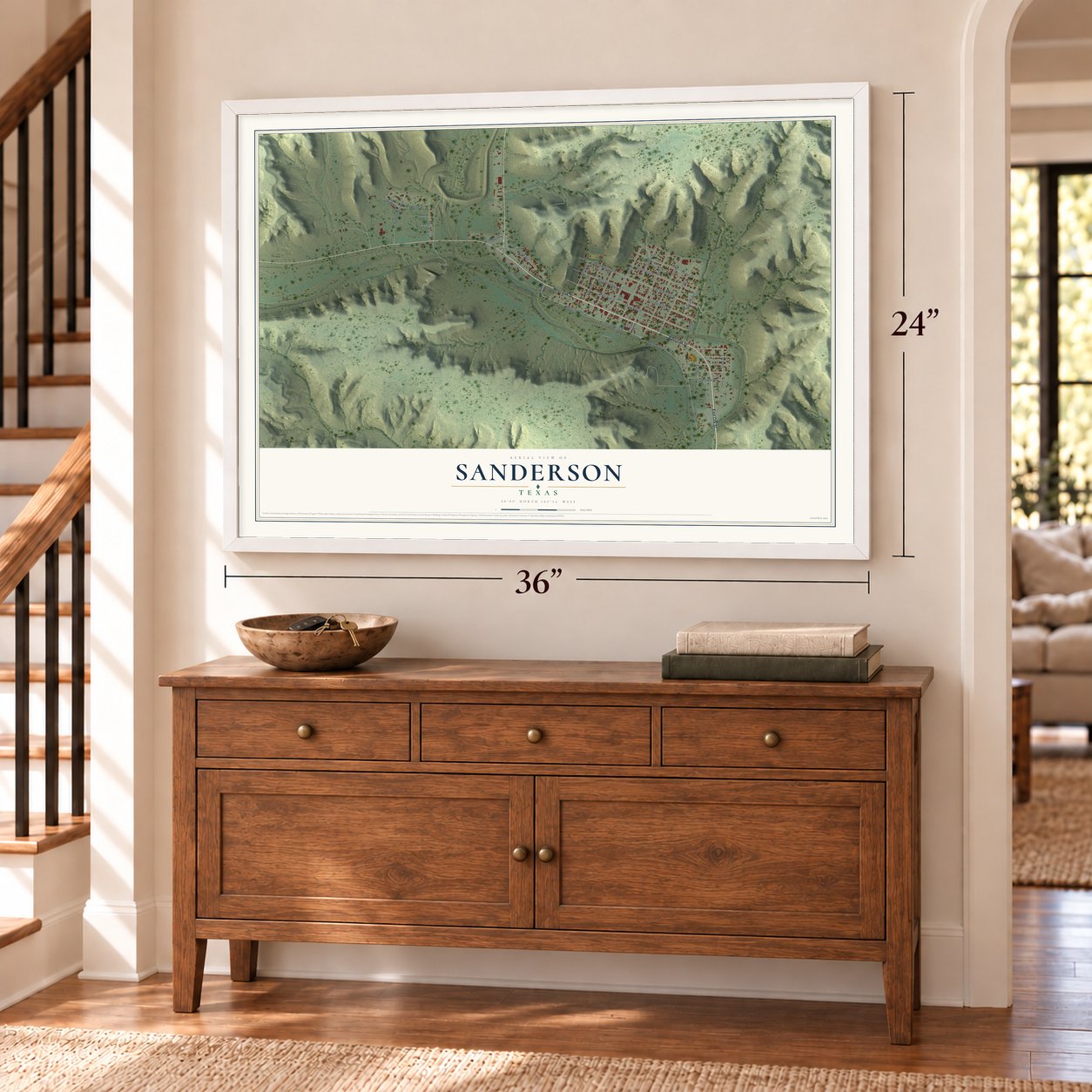 Sanderson, Texas map, 24 x 36 inch print in a white frame above a dresser by a staircase