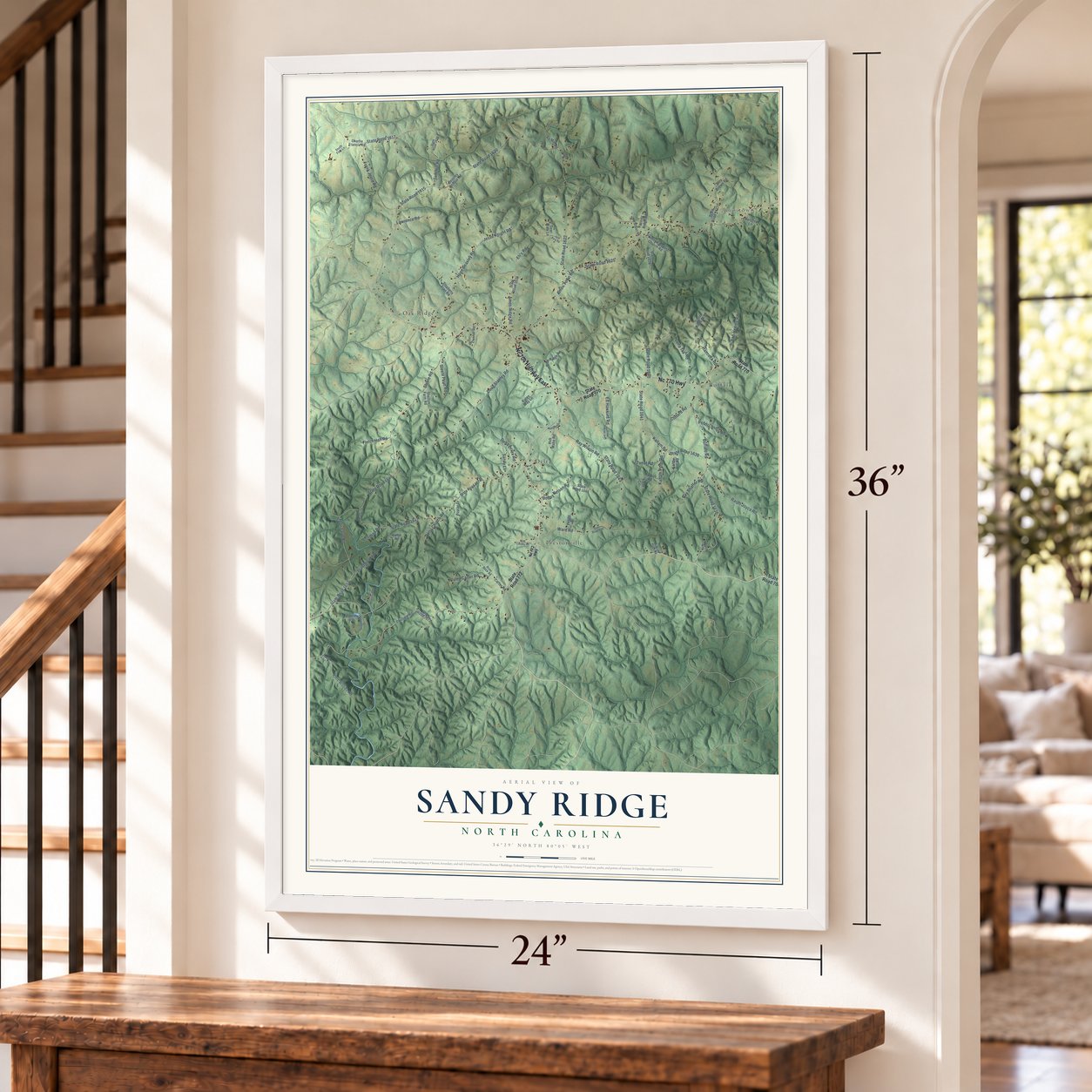 Sandy Ridge, North Carolina map, 24 x 36 inch print in a white frame by a staircase