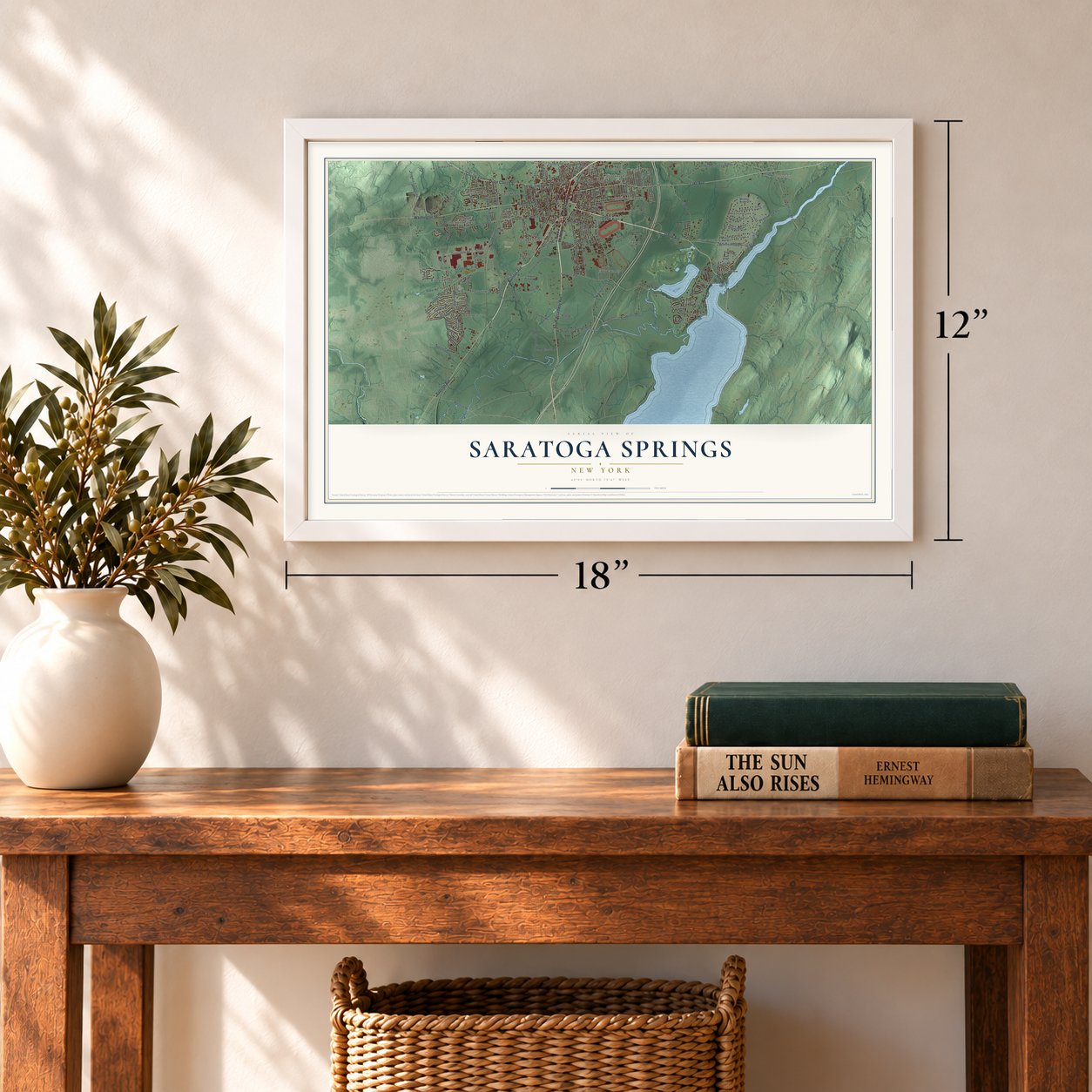 Saratoga Springs, New York map, 12 x 18 inch print in a white frame in an entryway