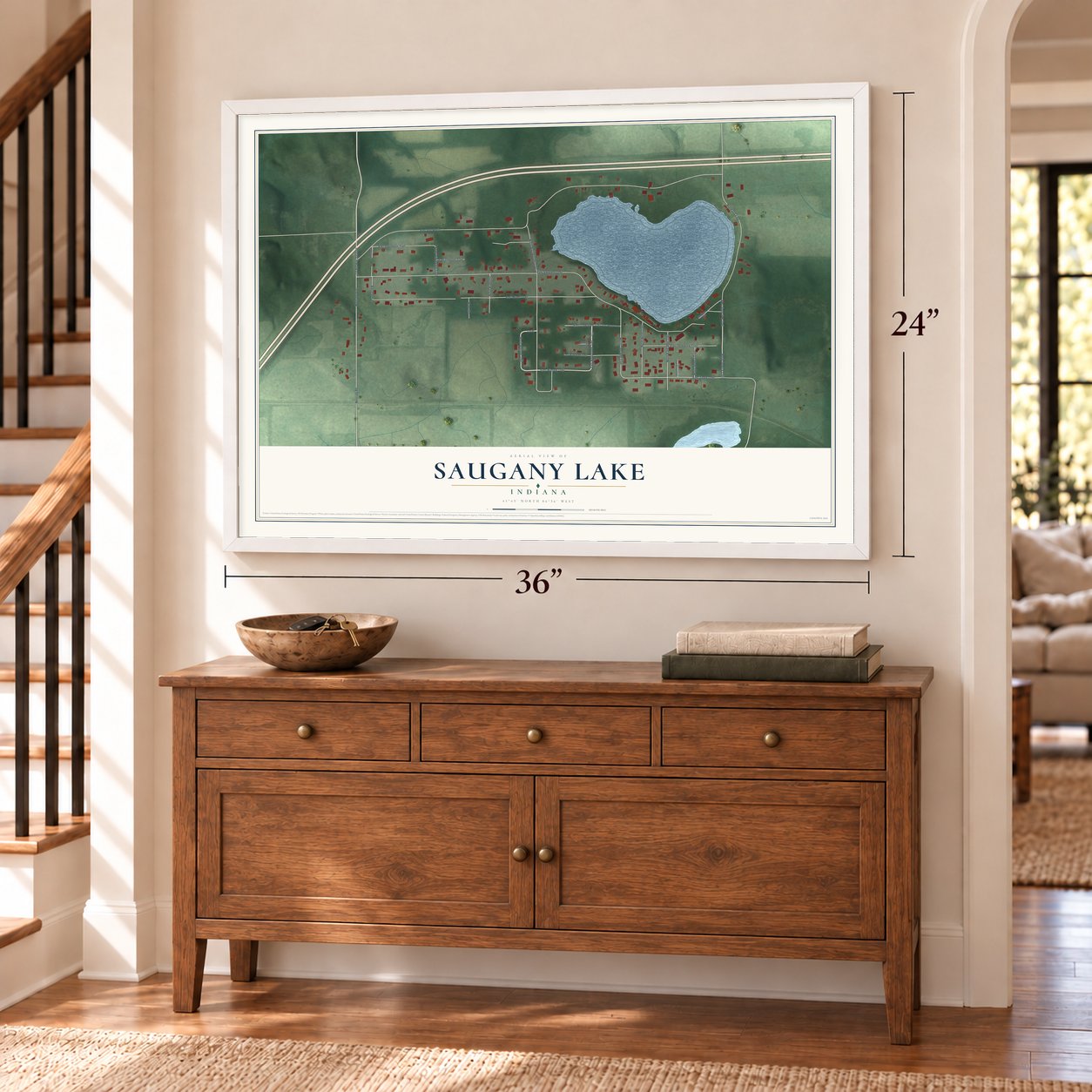Saugany Lake, Indiana map, 24 x 36 inch print in a white frame above a dresser by a staircase