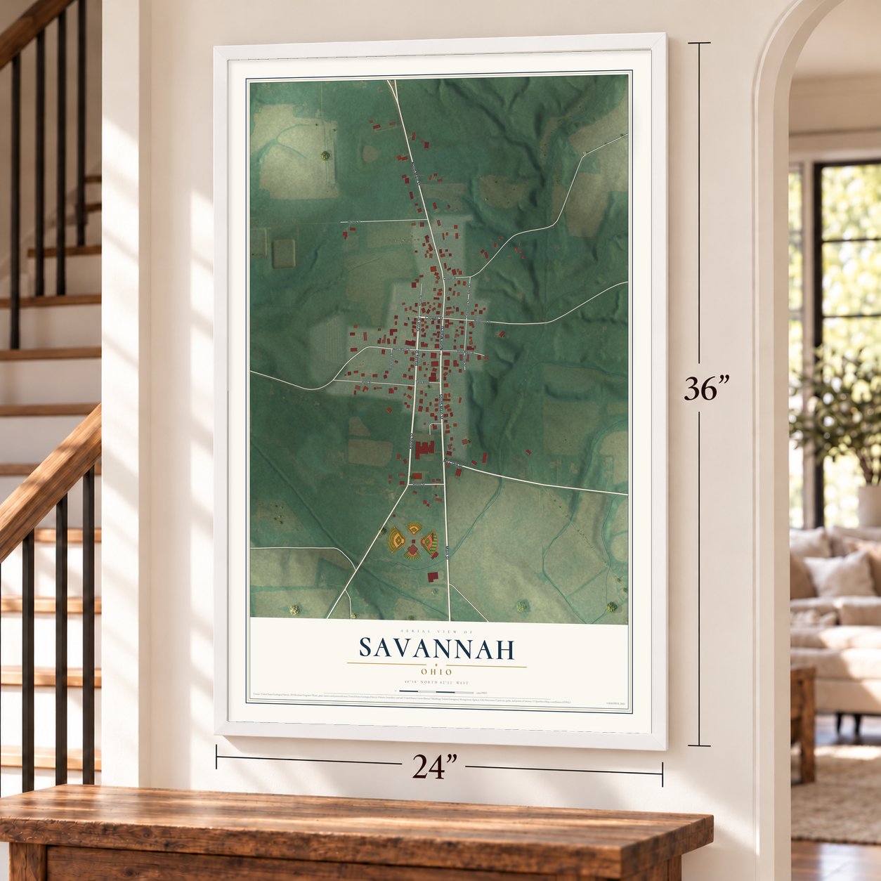 Savannah, Ohio map, 24 x 36 inch print in a white frame by a staircase