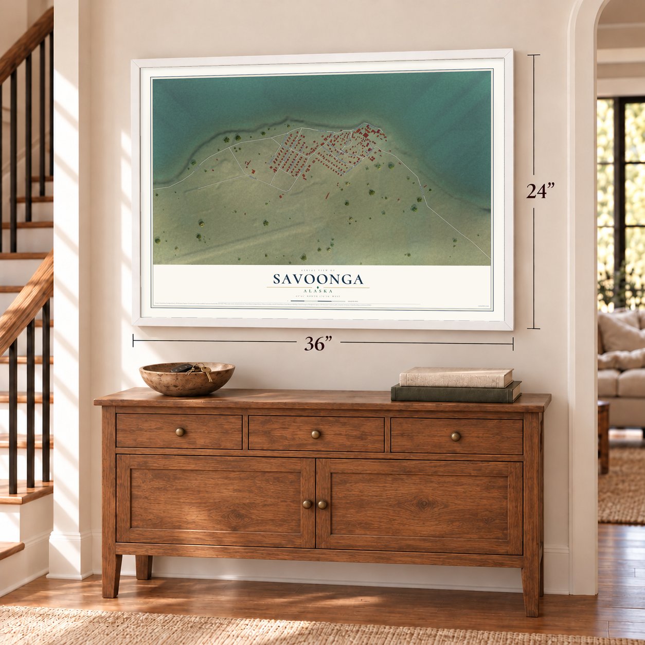 Savoonga, Alaska map, 24 x 36 inch print in a white frame above a dresser by a staircase