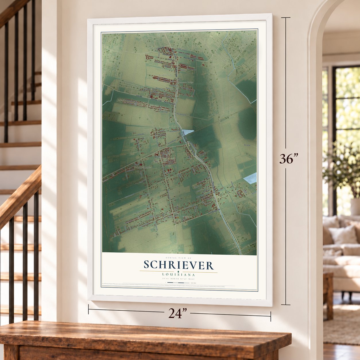 Schriever, Louisiana map, 24 x 36 inch print in a white frame by a staircase