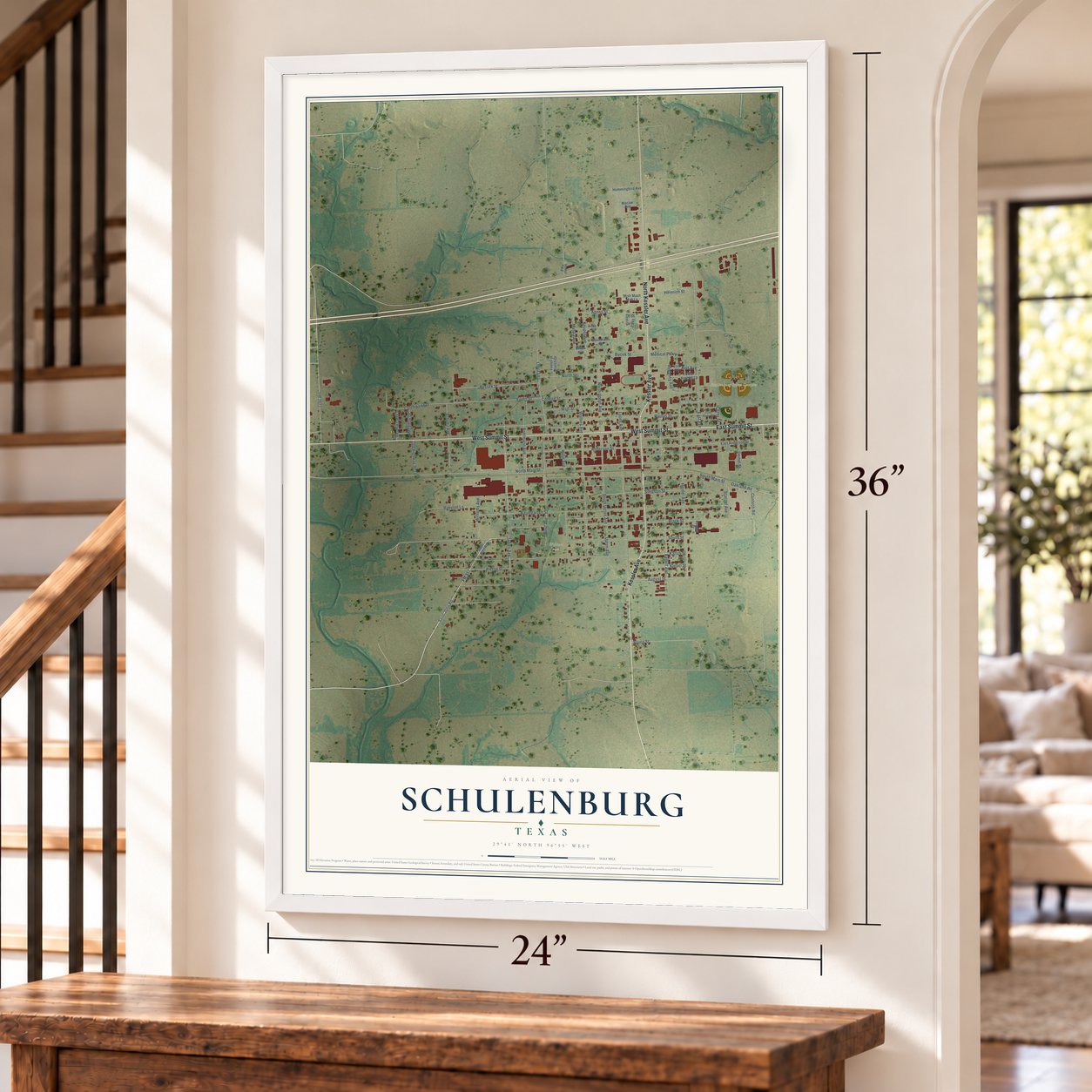 Schulenburg, Texas map, 24 x 36 inch print in a white frame by a staircase