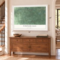 Schuyler Falls, New York map, 24 x 36 inch print in a white frame above a dresser by a staircase