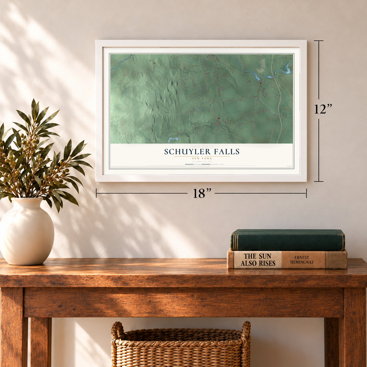 Schuyler Falls, New York map, 12 x 18 inch print in a white frame in an entryway