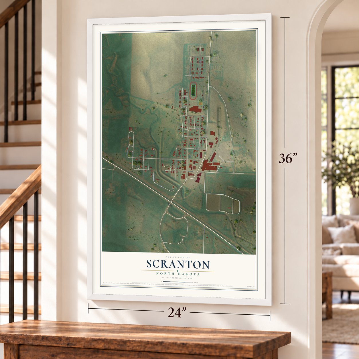 Scranton, North Dakota map, 24 x 36 inch print in a white frame by a staircase