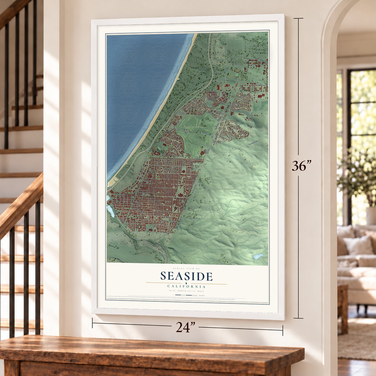 Seaside, California map, 24 x 36 inch print in a white frame by a staircase