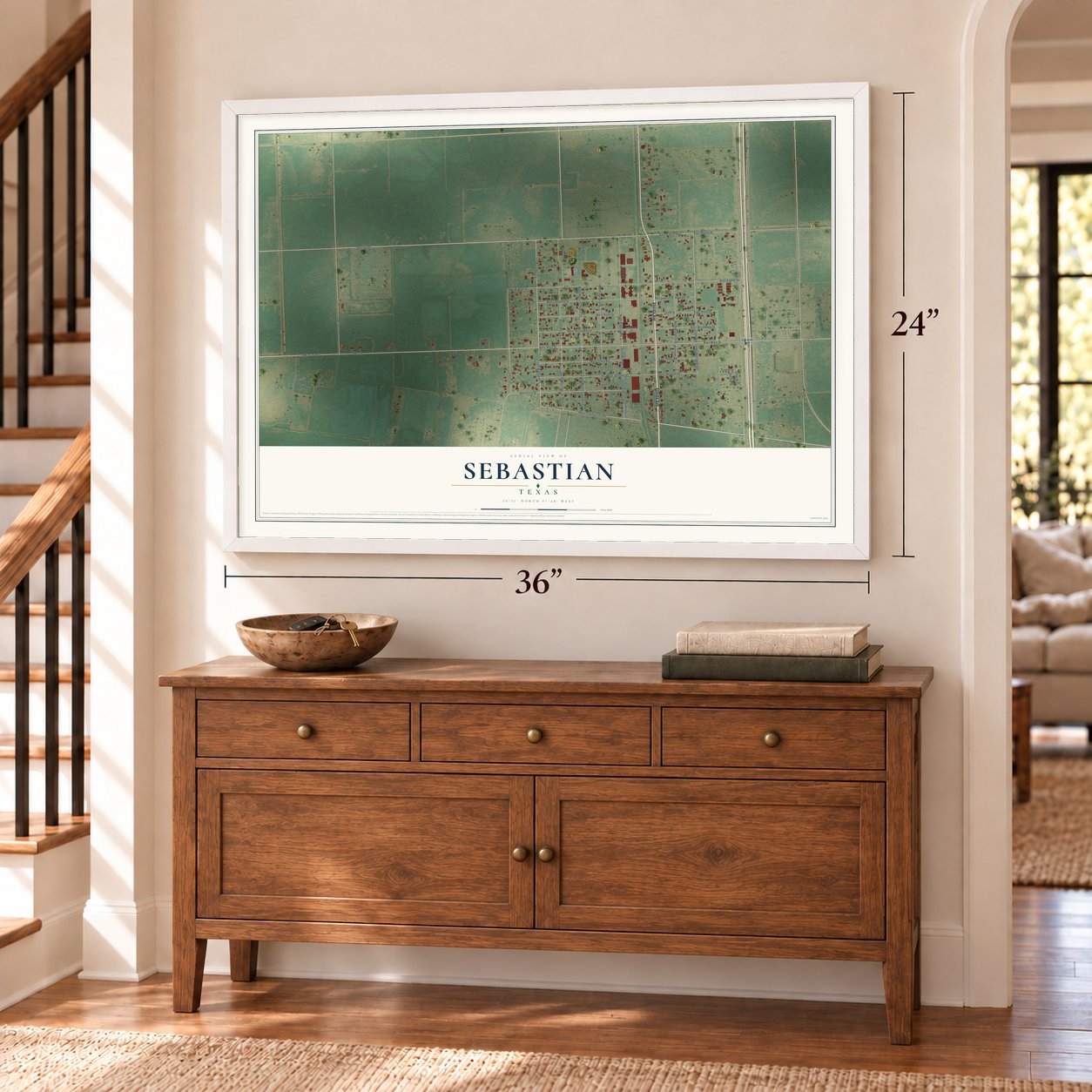 Sebastian, Texas map, 24 x 36 inch print in a white frame above a dresser by a staircase