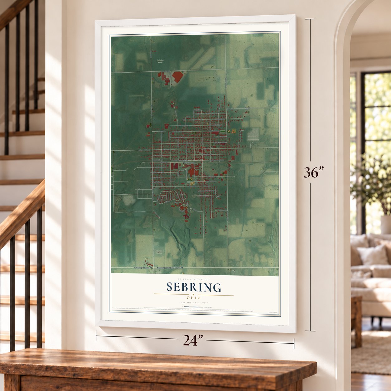 Sebring, Ohio map, 24 x 36 inch print in a white frame by a staircase