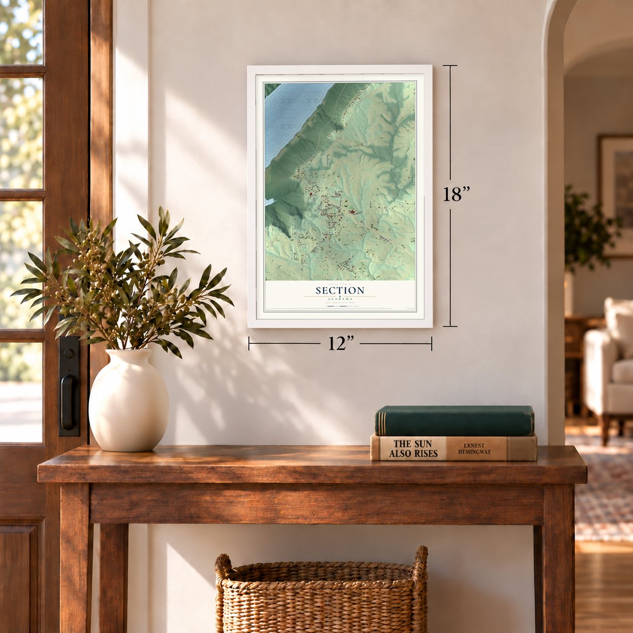 Section, Alabama map, 12 x 18 inch print in a white frame in an entryway