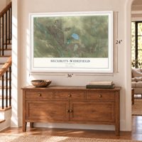 Security-Widefield, Colorado map, 24 x 36 inch print in a white frame above a dresser by a staircase