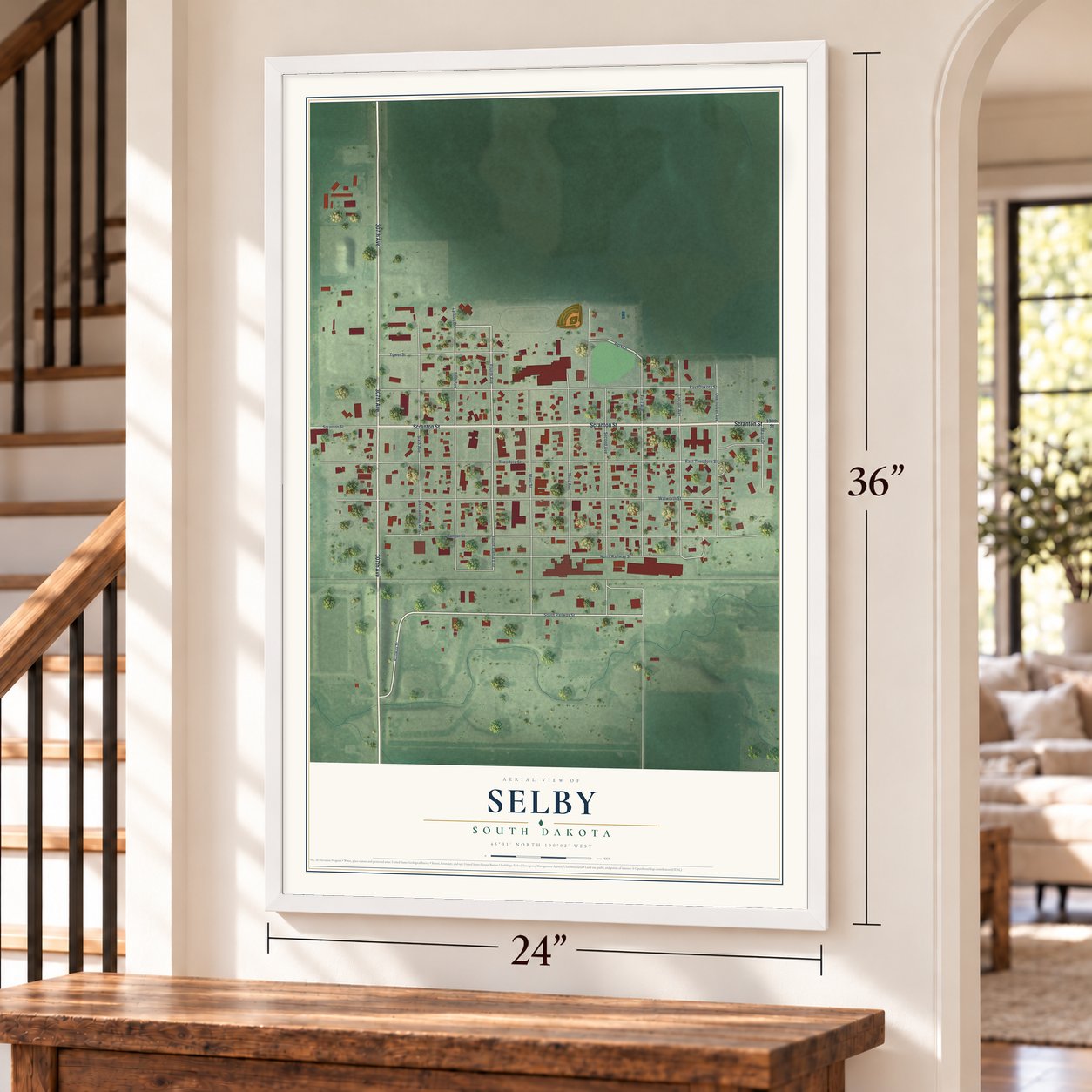 Selby, South Dakota map, 24 x 36 inch print in a white frame by a staircase