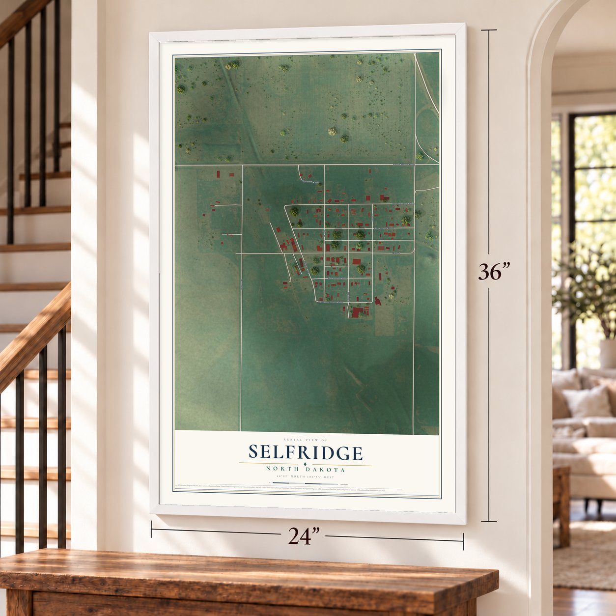 Selfridge, North Dakota map, 24 x 36 inch print in a white frame by a staircase