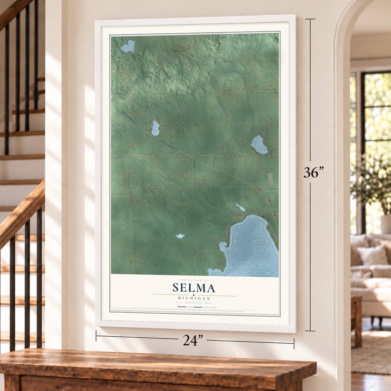 Selma, Michigan map, 24 x 36 inch print in a white frame by a staircase