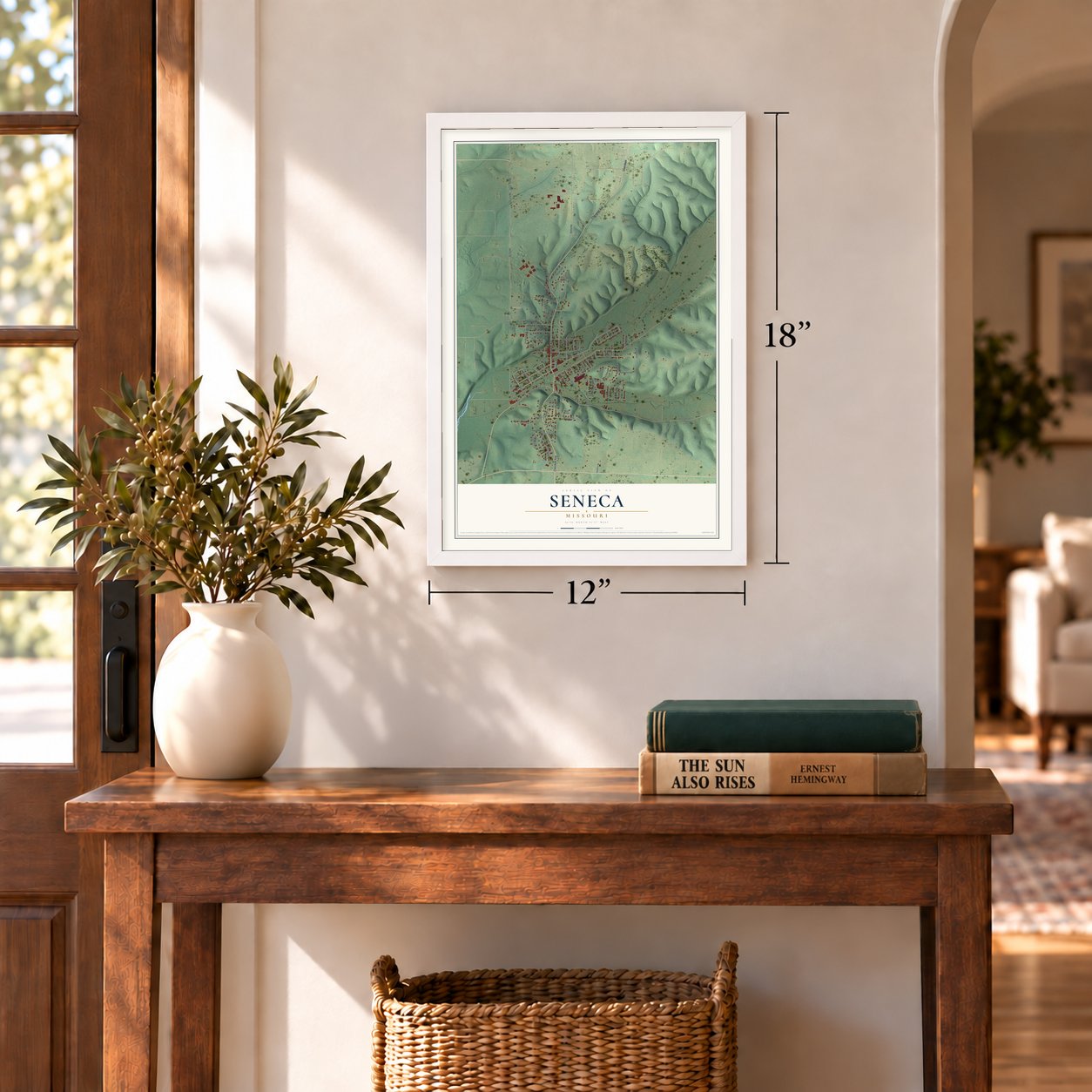 Seneca, Missouri map, 12 x 18 inch print in a white frame in an entryway