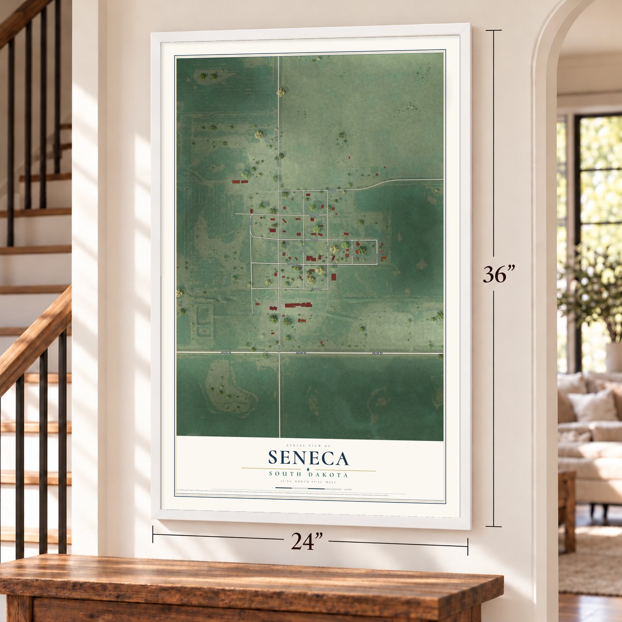 Seneca, South Dakota map, 24 x 36 inch print in a white frame by a staircase